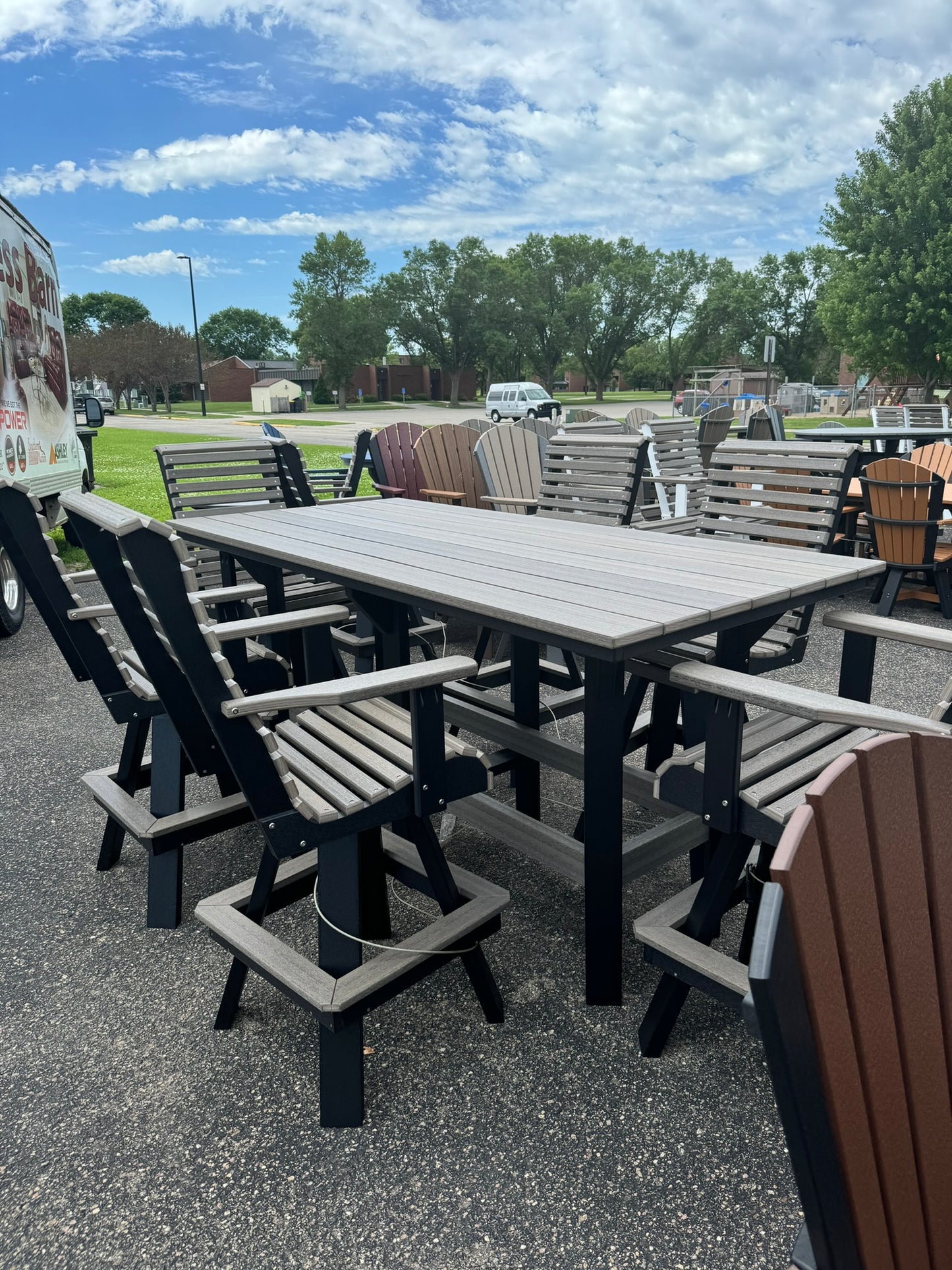 7' Bar Table with 6 Rollback Swivel Bar Chairs in Black & Coastal