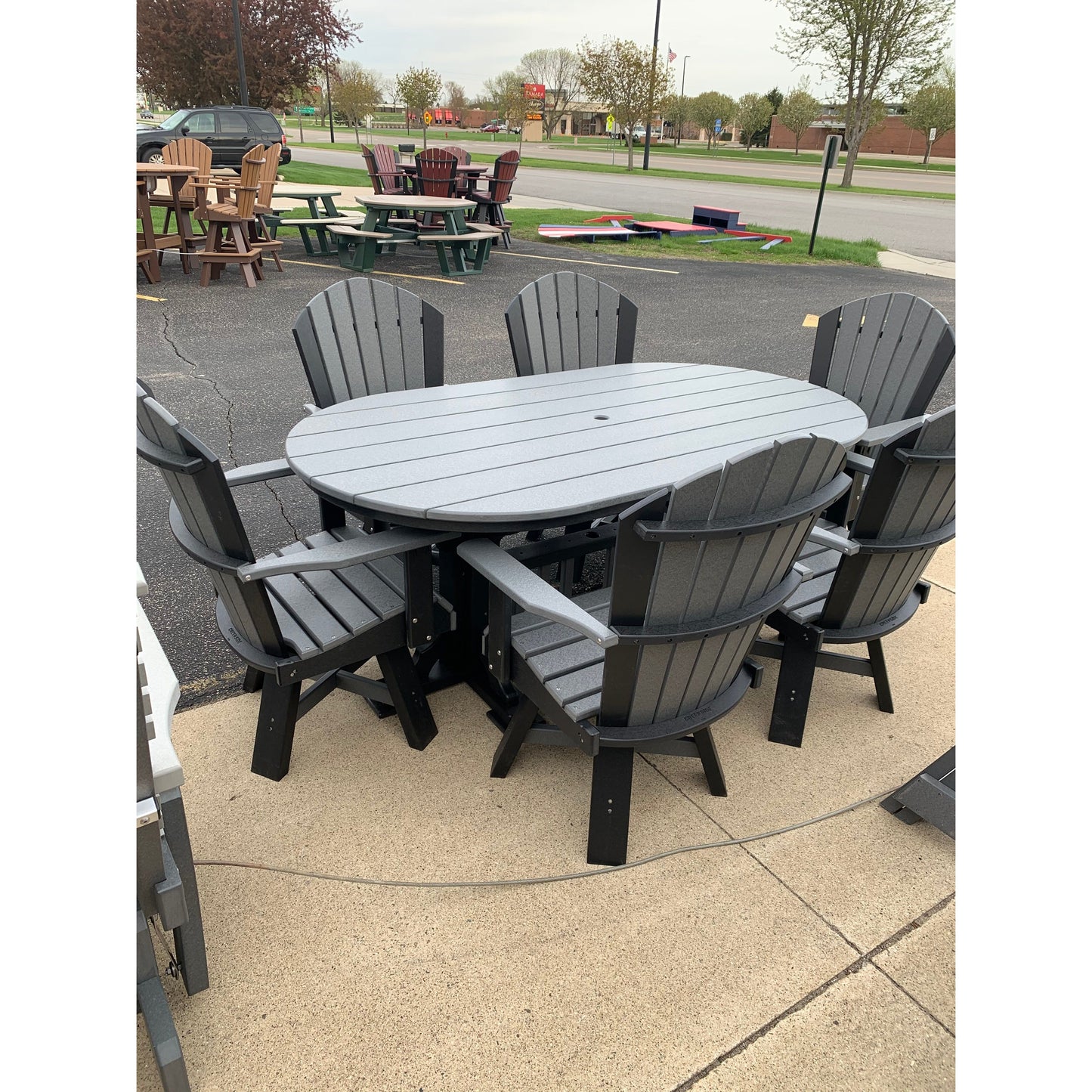 7'  Oval Table with 6 Swivel Chairs