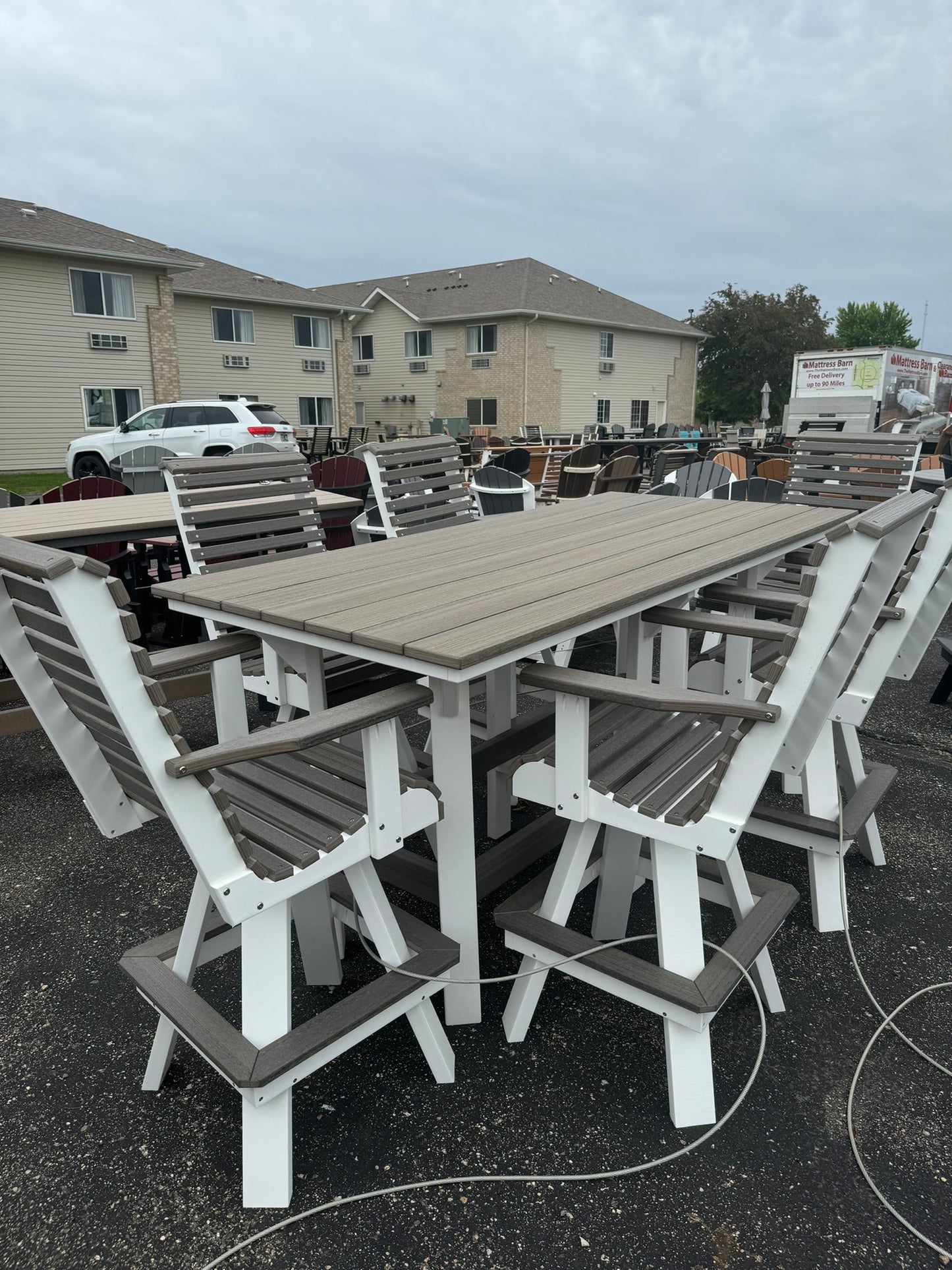 7' Bar Table with 6 Rollback Swivel Bar Chairs in Black & Coastal